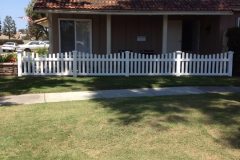 Front yard white picket vinyl fence