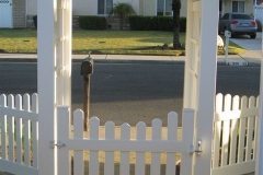 White picket vinyl gate