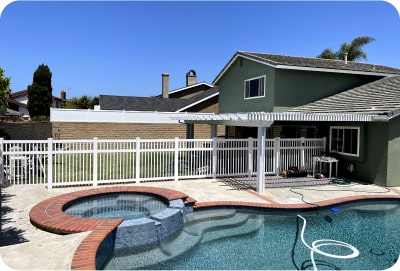 Vinyl gate with a backyard pool