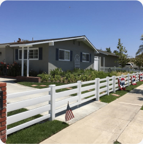 Vinyl fence and gate with American flags